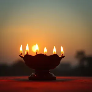 captivating sacred Navratri lamp with red flame at sunrise — good morning durga images wishes wallpaper