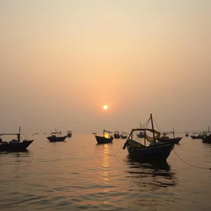 radiant good morning images odia image WhatsApp picture: Odia fishing village at dawn, golden sunrise on water - good morning images in odia