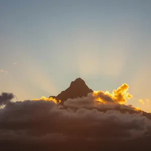 sunrise over sacred mountain with golden clouds, warm good morning ram images design greeting card