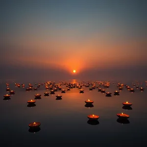 good morning ram images wallpaper graphic featuring elegant sunrise over sacred lake with floating diyas - good morning ram images